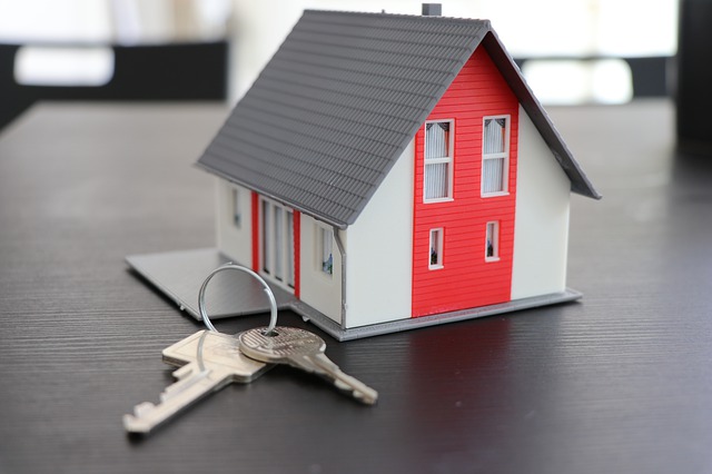 small house with a set of keys