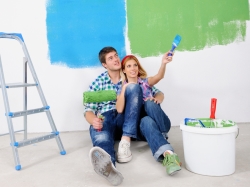 couple painting walls